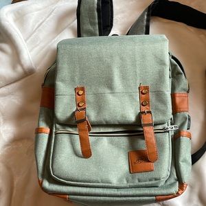 Lite green canvas backpack. From Once Upon a Book club.